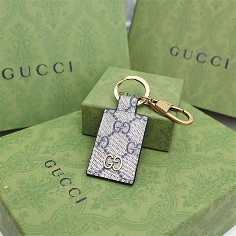 portachiavi gucci falso|Gucci handbags logo.